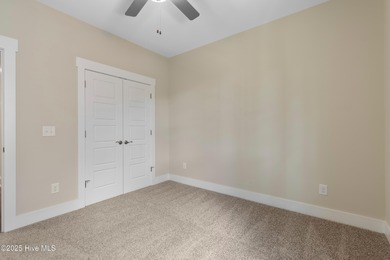 This exceptional new lakefront home by Langbeen Builders, Inc on The Lakes Country Club in North Carolina - for sale on GolfHomes.com, golf home, golf lot