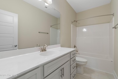 This exceptional new lakefront home by Langbeen Builders, Inc on The Lakes Country Club in North Carolina - for sale on GolfHomes.com, golf home, golf lot