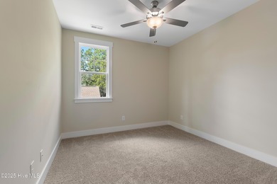 This exceptional new lakefront home by Langbeen Builders, Inc on The Lakes Country Club in North Carolina - for sale on GolfHomes.com, golf home, golf lot