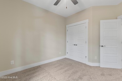 This exceptional new lakefront home by Langbeen Builders, Inc on The Lakes Country Club in North Carolina - for sale on GolfHomes.com, golf home, golf lot