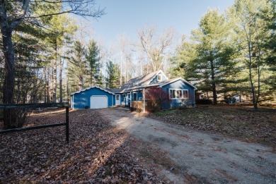 Discover the perfect retreat in this cozy chalet, ideally on Burning Oak Country Club in Michigan - for sale on GolfHomes.com, golf home, golf lot