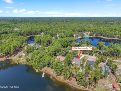 This exceptional new lakefront home by Langbeen Builders, Inc on The Lakes Country Club in North Carolina - for sale on GolfHomes.com, golf home, golf lot