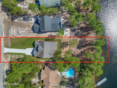 This exceptional new lakefront home by Langbeen Builders, Inc on The Lakes Country Club in North Carolina - for sale on GolfHomes.com, golf home, golf lot