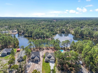 This exceptional new lakefront home by Langbeen Builders, Inc on The Lakes Country Club in North Carolina - for sale on GolfHomes.com, golf home, golf lot