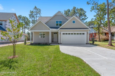 This exceptional new lakefront home by Langbeen Builders, Inc on The Lakes Country Club in North Carolina - for sale on GolfHomes.com, golf home, golf lot