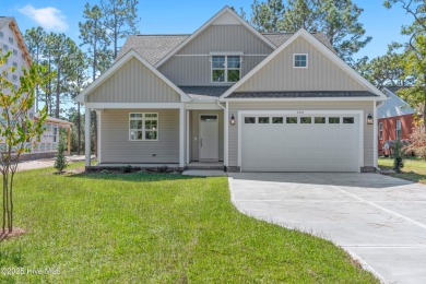 This exceptional new lakefront home by Langbeen Builders, Inc on The Lakes Country Club in North Carolina - for sale on GolfHomes.com, golf home, golf lot