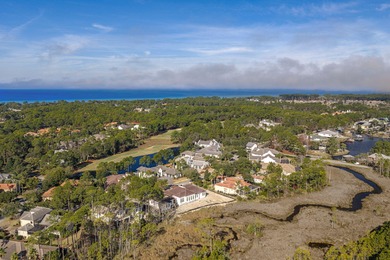 This distinguished custom-built residence is situated within the on Sandestin Golf and Beach Resort - Raven in Florida - for sale on GolfHomes.com, golf home, golf lot