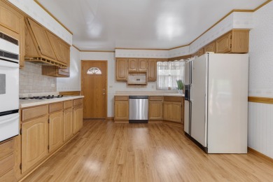 Welcome to this lovingly maintained one-owner ranch ideally on Bonnie Brook Golf Course in Illinois - for sale on GolfHomes.com, golf home, golf lot