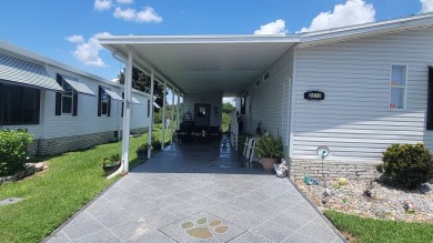 Experience the allure of this captivating home. The photos don't on Mountain Lake Golf Course in Florida - for sale on GolfHomes.com, golf home, golf lot