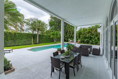 PRICE REDUCTION*. This beautiful home on desirable Golf Brook Dr on Palm Beach Polo and Country Club in Florida - for sale on GolfHomes.com, golf home, golf lot