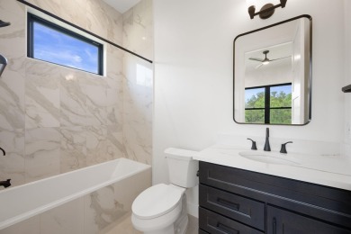 A beautifully designed, custom-built new construction on Ram Rock Golf Course in Texas - for sale on GolfHomes.com, golf home, golf lot