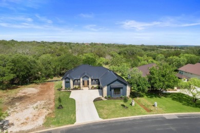 A beautifully designed, custom-built new construction on Ram Rock Golf Course in Texas - for sale on GolfHomes.com, golf home, golf lot