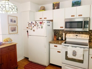 MUST SEE! Beautifully remodeled 2nd floor 2/2 condo in an active on Sunrise Lakes Phase IV Golf Course in Florida - for sale on GolfHomes.com, golf home, golf lot