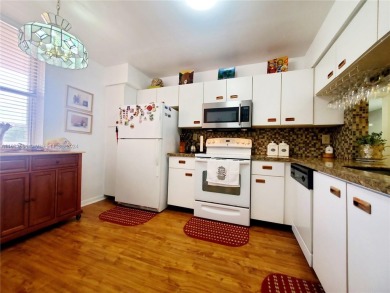 MUST SEE! Beautifully remodeled 2nd floor 2/2 condo in an active on Sunrise Lakes Phase IV Golf Course in Florida - for sale on GolfHomes.com, golf home, golf lot