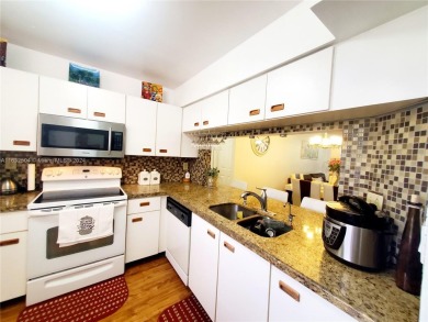 MUST SEE! Beautifully remodeled 2nd floor 2/2 condo in an active on Sunrise Lakes Phase IV Golf Course in Florida - for sale on GolfHomes.com, golf home, golf lot