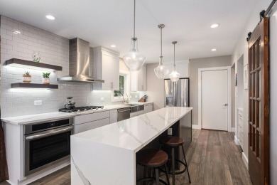 Introducing an exceptional Westwood home, perfectly poised on on Grand Prairie Golf Course in Michigan - for sale on GolfHomes.com, golf home, golf lot
