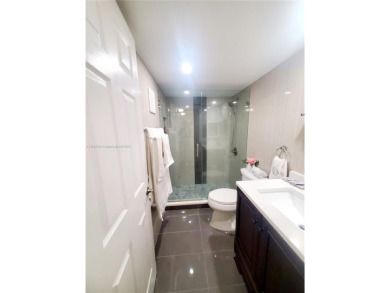 MUST SEE! Beautifully remodeled 2nd floor 2/2 condo in an active on Sunrise Lakes Phase IV Golf Course in Florida - for sale on GolfHomes.com, golf home, golf lot