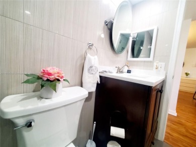 MUST SEE! Beautifully remodeled 2nd floor 2/2 condo in an active on Sunrise Lakes Phase IV Golf Course in Florida - for sale on GolfHomes.com, golf home, golf lot