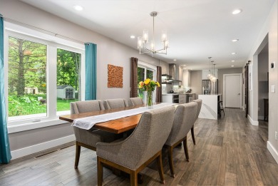 Introducing an exceptional Westwood home, perfectly poised on on Grand Prairie Golf Course in Michigan - for sale on GolfHomes.com, golf home, golf lot