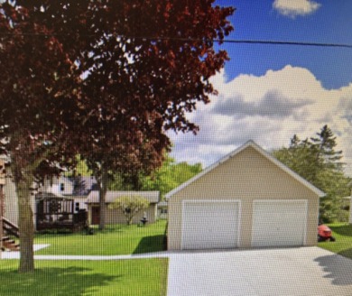 Welcome home! Character is portrayed in this 4 bedroom home on Hon-E-Kor Country Club in Wisconsin - for sale on GolfHomes.com, golf home, golf lot