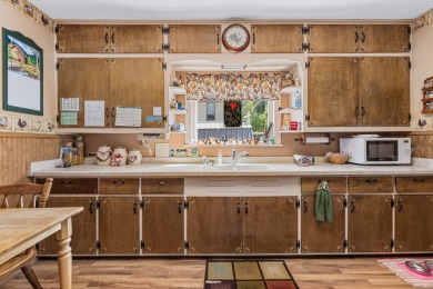 Welcome home! Character is portrayed in this 4 bedroom home on Hon-E-Kor Country Club in Wisconsin - for sale on GolfHomes.com, golf home, golf lot
