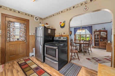 Welcome home! Character is portrayed in this 4 bedroom home on Hon-E-Kor Country Club in Wisconsin - for sale on GolfHomes.com, golf home, golf lot
