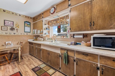 Welcome home! Character is portrayed in this 4 bedroom home on Hon-E-Kor Country Club in Wisconsin - for sale on GolfHomes.com, golf home, golf lot