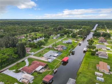 Under contract-accepting backup offers. WATERFRONT HOME on one on Indian Lake Estates Golf and Country Club in Florida - for sale on GolfHomes.com, golf home, golf lot