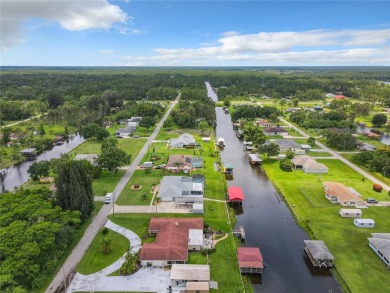 Under contract-accepting backup offers. WATERFRONT HOME on one on Indian Lake Estates Golf and Country Club in Florida - for sale on GolfHomes.com, golf home, golf lot