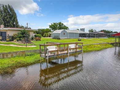 Under contract-accepting backup offers. WATERFRONT HOME on one on Indian Lake Estates Golf and Country Club in Florida - for sale on GolfHomes.com, golf home, golf lot