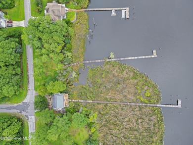 Waterfront homesite with extensive dock frontage in the gated on Harbour Point Golf Club in North Carolina - for sale on GolfHomes.com, golf home, golf lot