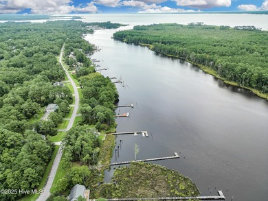 Waterfront homesite with extensive dock frontage in the gated on Harbour Point Golf Club in North Carolina - for sale on GolfHomes.com, golf home, golf lot