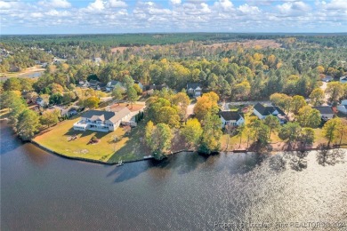 This charming waterfront home on Carolina Lake is the perfect on Carolina Lakes Country Club in North Carolina - for sale on GolfHomes.com, golf home, golf lot