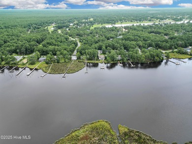 Waterfront homesite with extensive dock frontage in the gated on Harbour Point Golf Club in North Carolina - for sale on GolfHomes.com, golf home, golf lot