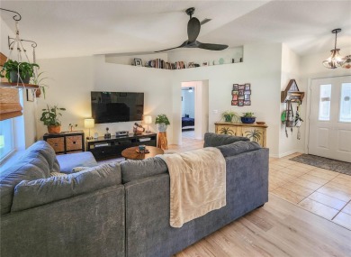 Welcome to this beautifully updated, move-in-ready home offering on The Grand Club - Pine Lakes Course in Florida - for sale on GolfHomes.com, golf home, golf lot