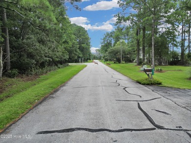 Waterfront homesite with extensive dock frontage in the gated on Harbour Point Golf Club in North Carolina - for sale on GolfHomes.com, golf home, golf lot
