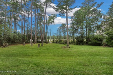 Waterfront homesite with extensive dock frontage in the gated on Harbour Point Golf Club in North Carolina - for sale on GolfHomes.com, golf home, golf lot