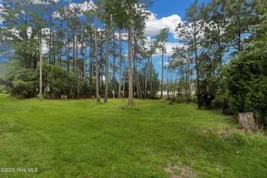 Waterfront homesite with extensive dock frontage in the gated on Harbour Point Golf Club in North Carolina - for sale on GolfHomes.com, golf home, golf lot