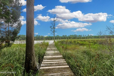 Build your dream home on this incredible waterfront lot located on Harbour Point Golf Club in North Carolina - for sale on GolfHomes.com, golf home, golf lot