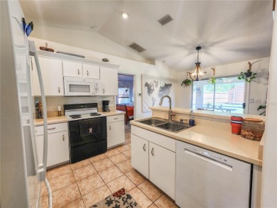 Welcome to this beautifully updated, move-in-ready home offering on The Grand Club - Pine Lakes Course in Florida - for sale on GolfHomes.com, golf home, golf lot