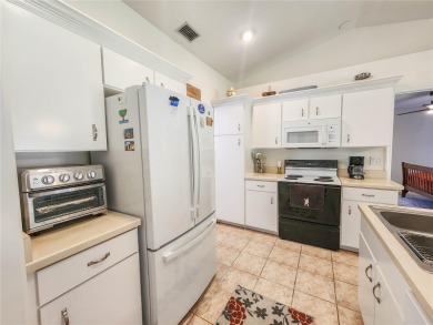 Welcome to this beautifully updated, move-in-ready home offering on The Grand Club - Pine Lakes Course in Florida - for sale on GolfHomes.com, golf home, golf lot