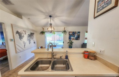 Welcome to this beautifully updated, move-in-ready home offering on The Grand Club - Pine Lakes Course in Florida - for sale on GolfHomes.com, golf home, golf lot
