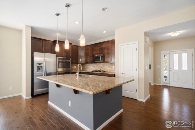 Well maintained Ranch with main floor primary bedroom and on Pelican Lakes Golf and Country Club in Colorado - for sale on GolfHomes.com, golf home, golf lot