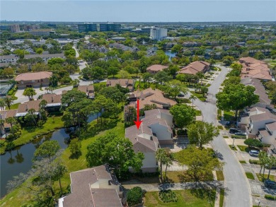 Under contract-accepting backup offers. Welcome to the top-rated on Feather Sound Country Club in Florida - for sale on GolfHomes.com, golf home, golf lot