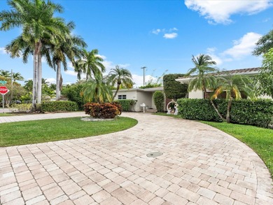 Rare waterfront opportunity in prestigious Normandy Shores. This on Normandy Shores Golf Course in Florida - for sale on GolfHomes.com, golf home, golf lot