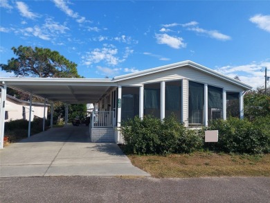 lovely 2bedroom/2bath mobile home located in the Family Nudist on Heritage Harbor Golf and Country Club in Florida - for sale on GolfHomes.com, golf home, golf lot