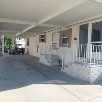 lovely 2bedroom/2bath mobile home located in the Family Nudist on Heritage Harbor Golf and Country Club in Florida - for sale on GolfHomes.com, golf home, golf lot