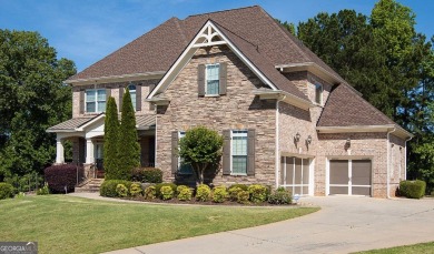 Nestled in the prestigious Heron Bay community, this stunning on Canongate At Heron Bay in Georgia - for sale on GolfHomes.com, golf home, golf lot