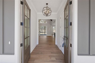 Timeless design, modern comfort, and the privacy of an oversized on Harbor Club Golf and Country Club in Georgia - for sale on GolfHomes.com, golf home, golf lot