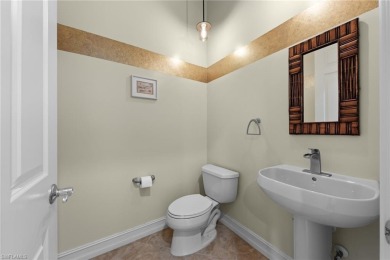 Welcome to 20060 Markward Crossing--a showstopping Villa Grande on The Club At Grandezza in Florida - for sale on GolfHomes.com, golf home, golf lot